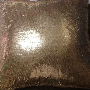 Gold sequined accent pillow